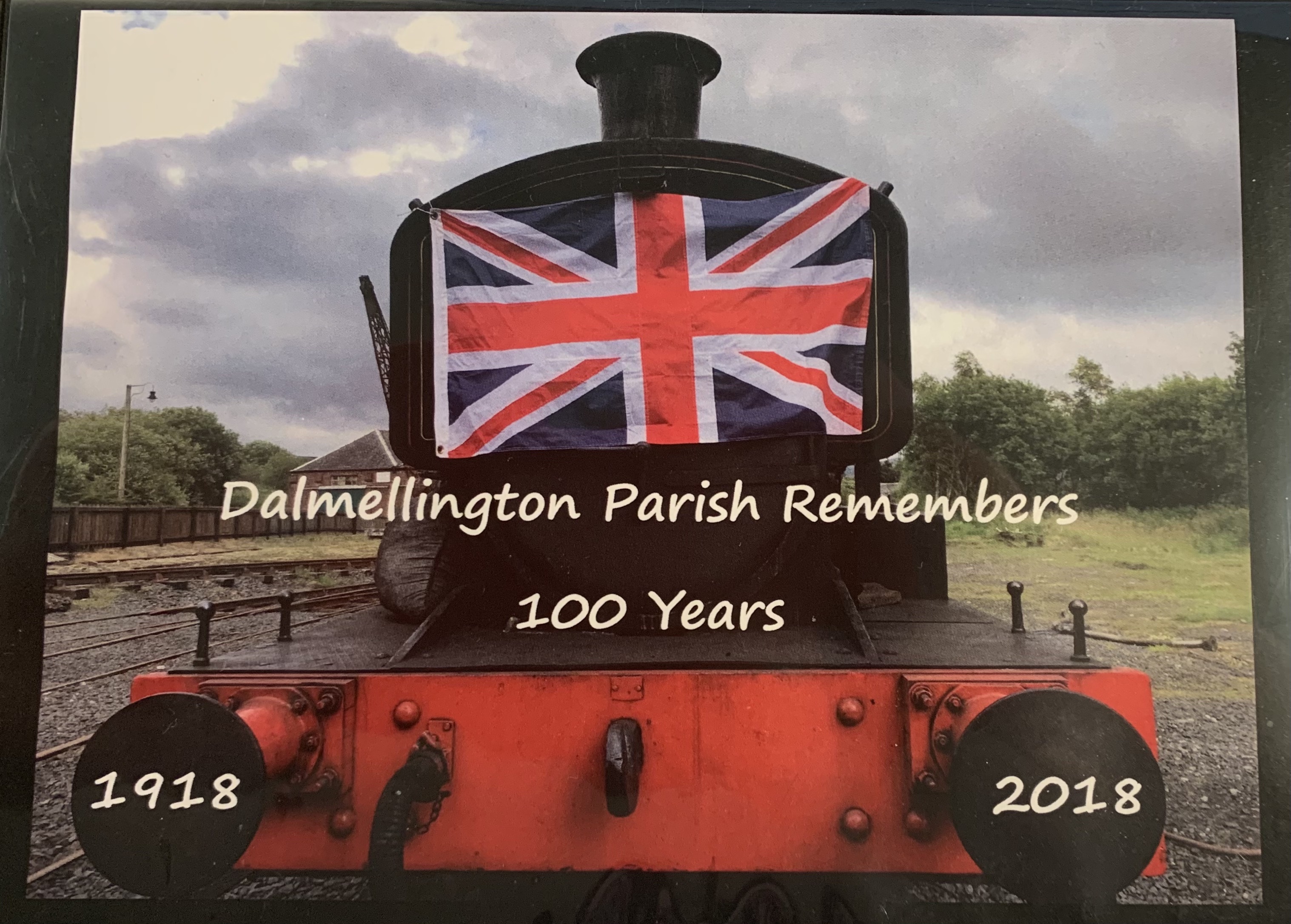 DVD cover showing a black and red steam train surrounded by trees and greenery. The text reads Dalmellington Remembers 100 years, 1918-2018